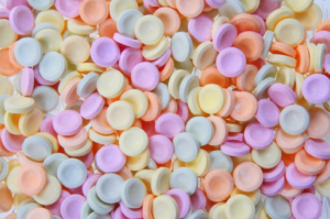 Como as Pastilhas Personalizadas Podem Aumentar o Valor Percebido da Sua Marca?